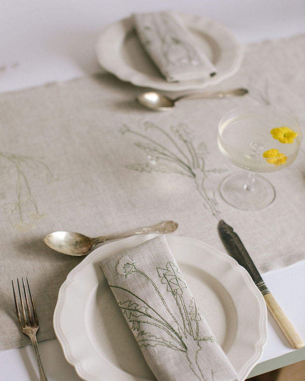 Irish linen table runner with embroidery of herbarium drawings