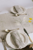 Irish linen table runner with embroidery of herbarium drawings