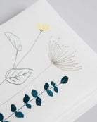 Irish wildflower embroidery on an ivory irish linen napkin