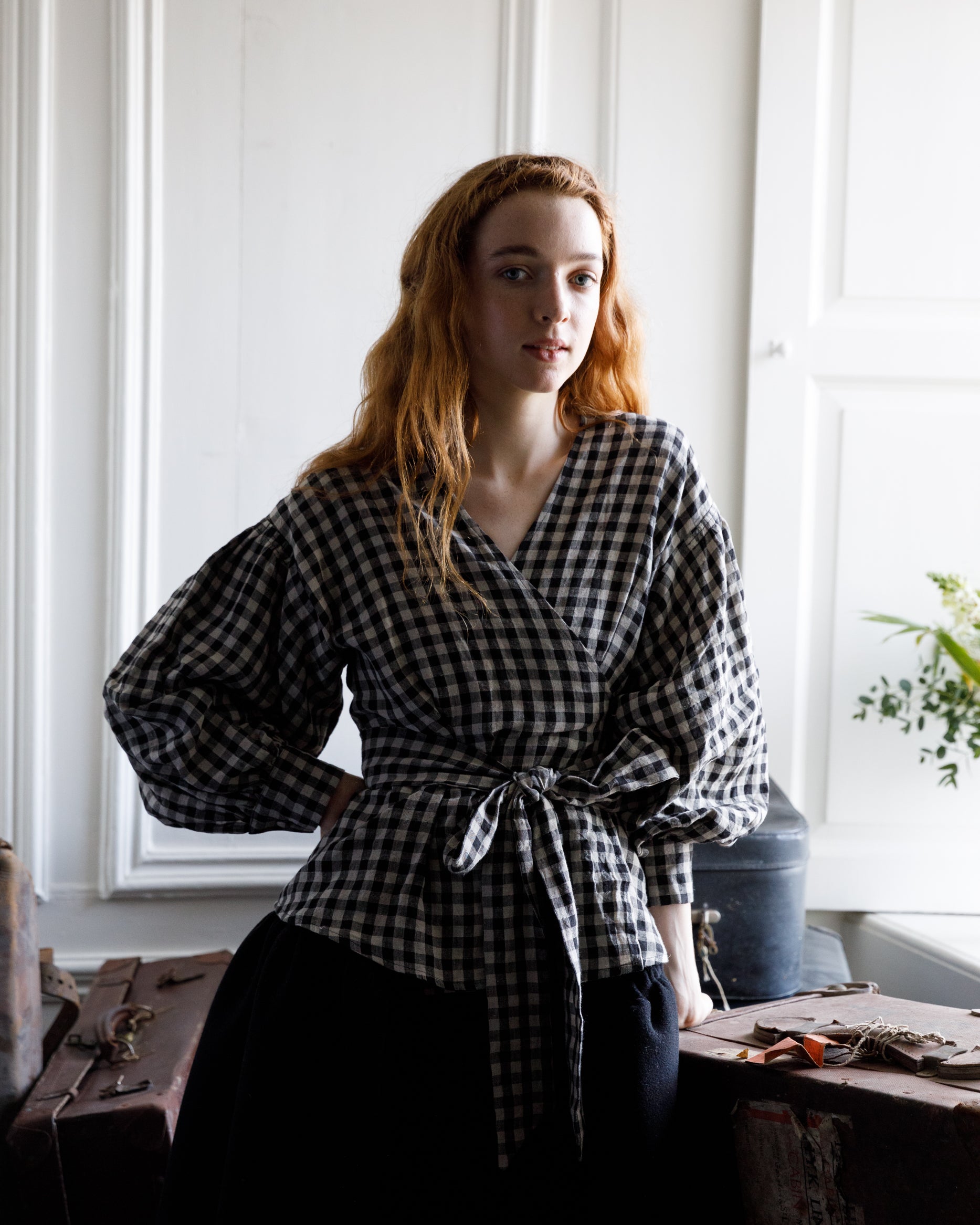 Irish linen wrap top with a dropped shoulder and voluminous sleeve. Ties around the waist with a bow at the front or back