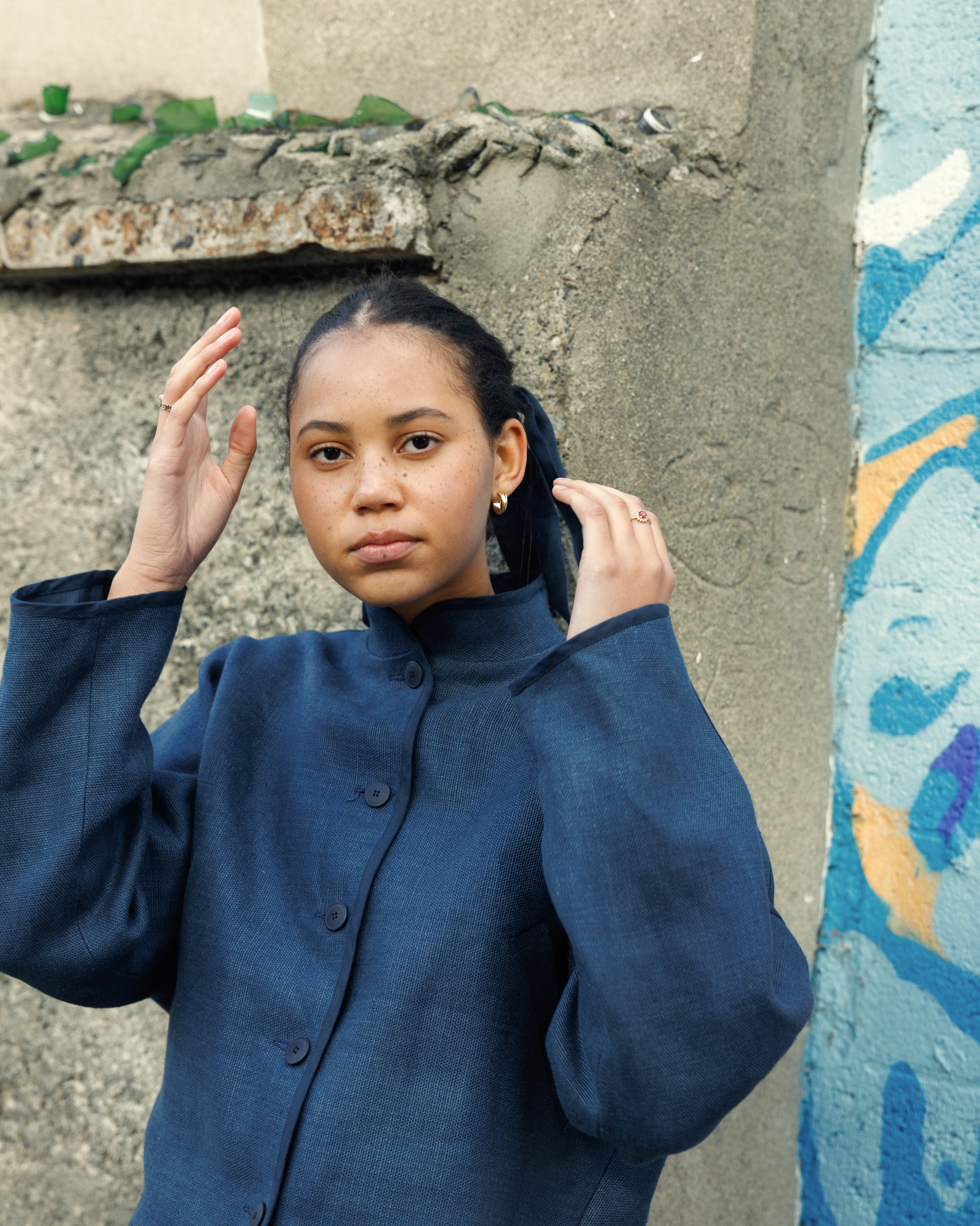 Cropped navy jacket in heavy irish linen with a bias binding finish 