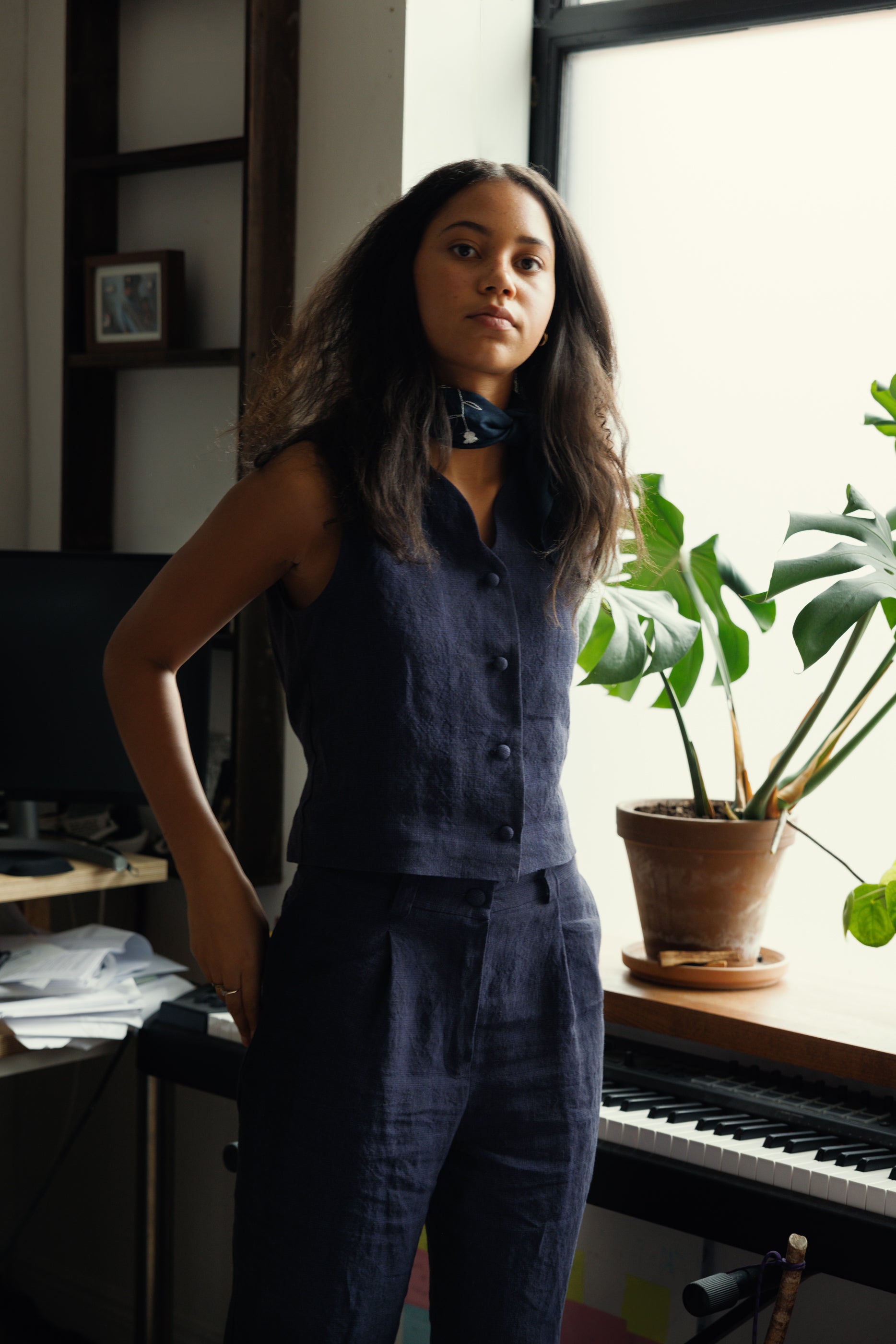Waistcoat in a subtle navy/black check with a scalloped neckline and cover buttons at the front 