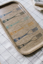 Square shaped Irish linen tray with rounded corners and fork embroidery 