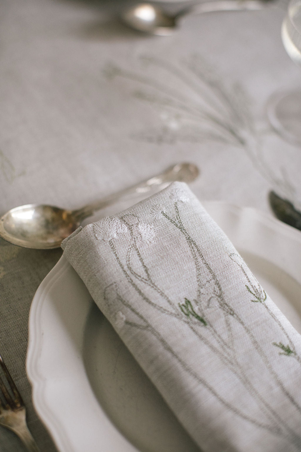 Embroidered plant on a natural Irish linen napkin 