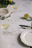 Irish linen table runner with plant embroidery running across the whole length