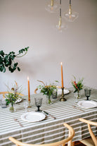 Irish linen tablecloth in an ivory, earthy green striped weave pattern
