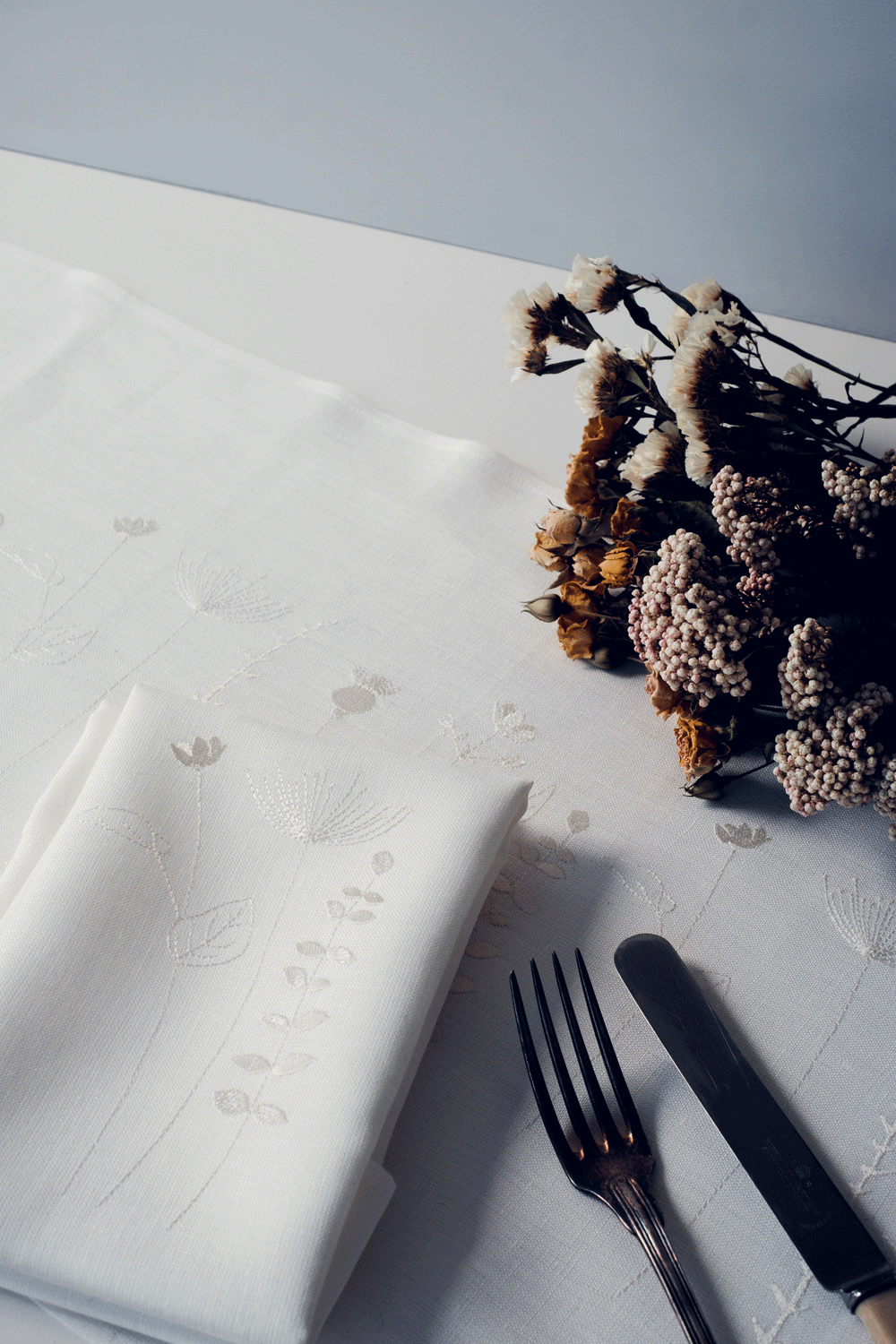 Irish linen table runner with irish wildflower embroidery in white 