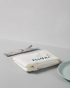 Irish linen napkins in ivory with earth coloured irish wildflower embroidery  