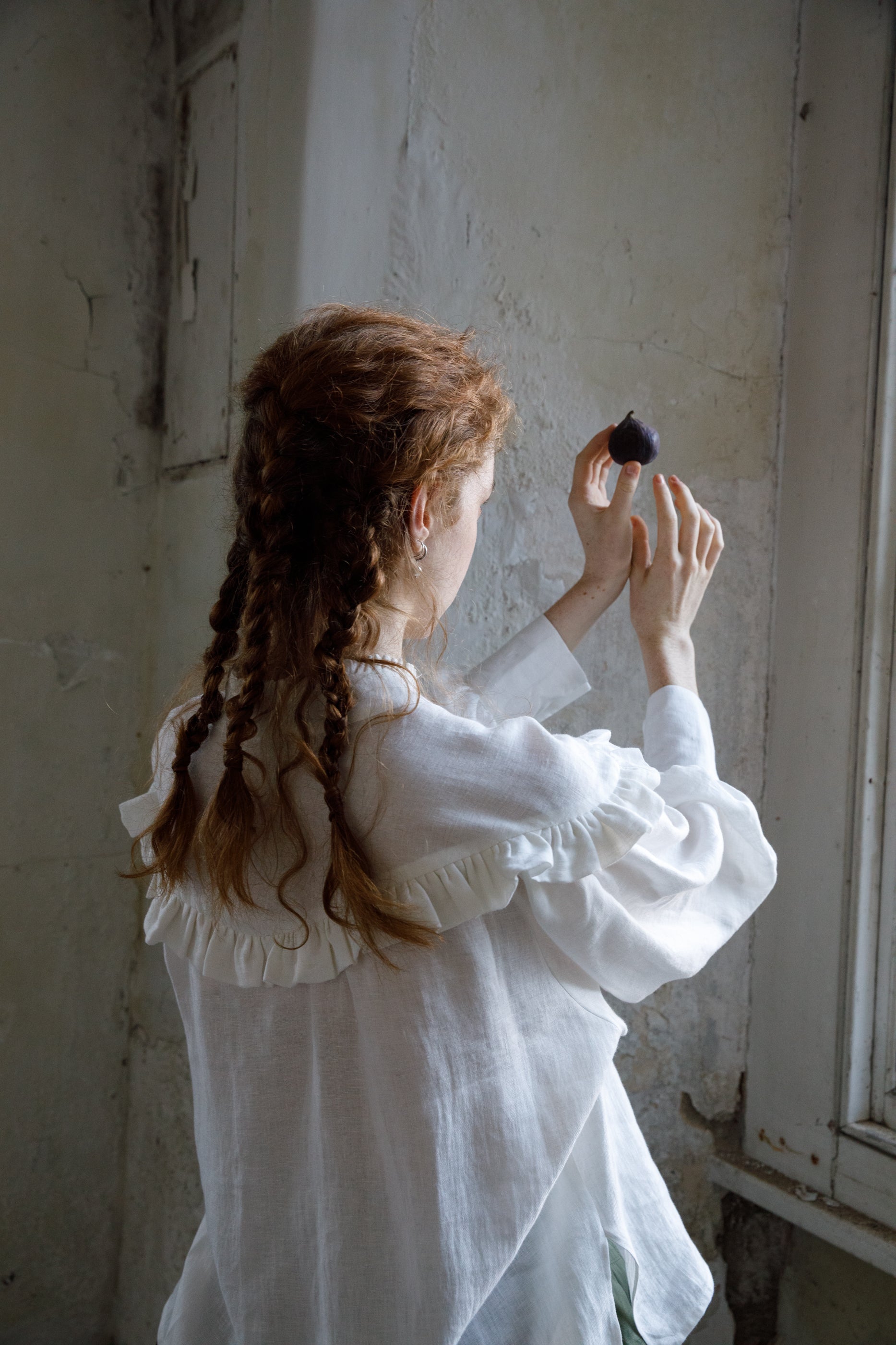 Ivory irish linen top with dropped shoulder, frill details on collar and across bust and back. 
