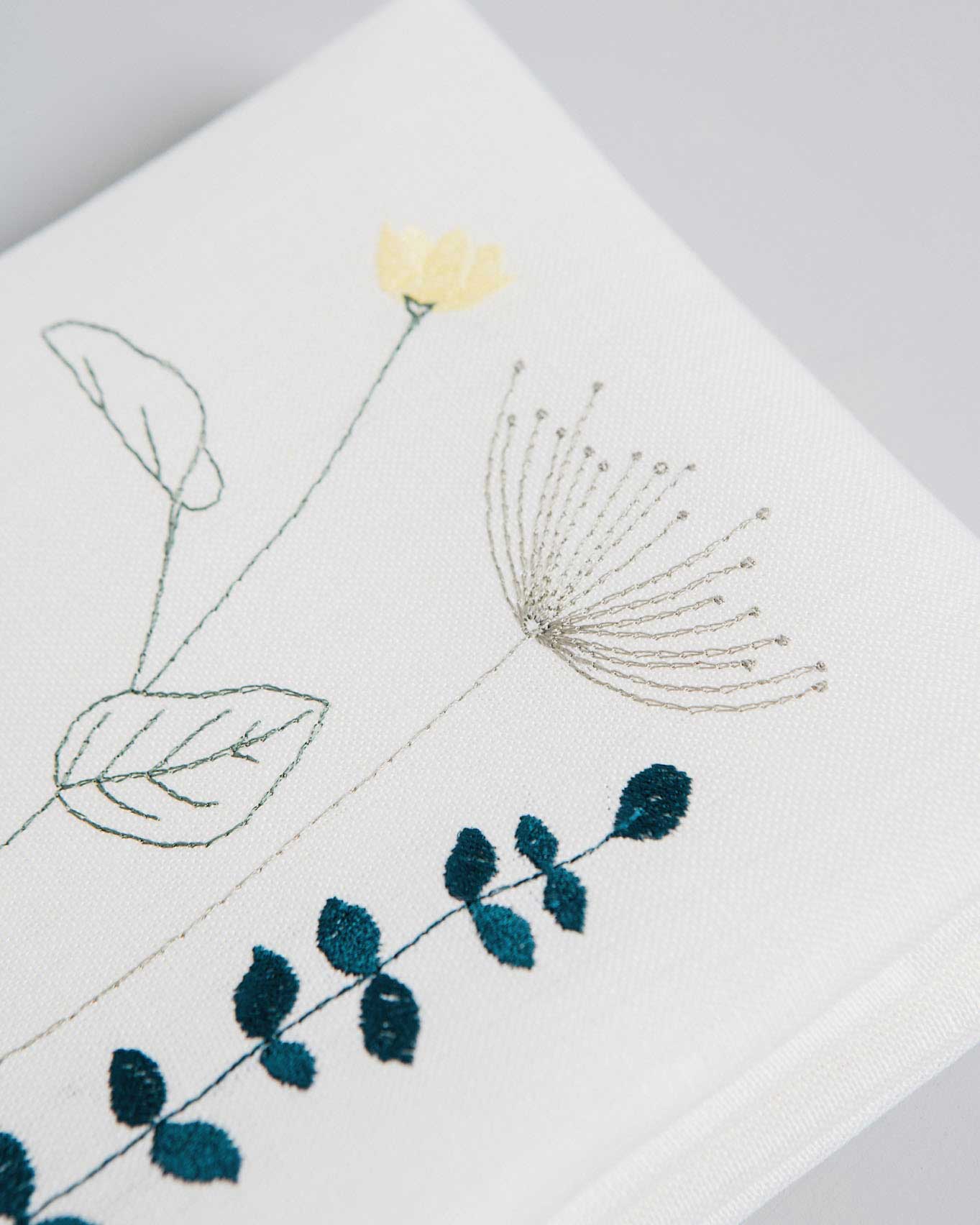 Irish wildflower embroidery on an ivory irish linen napkin 