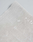 White Irish wildflower embroidery on an Irish linen tablerunner 