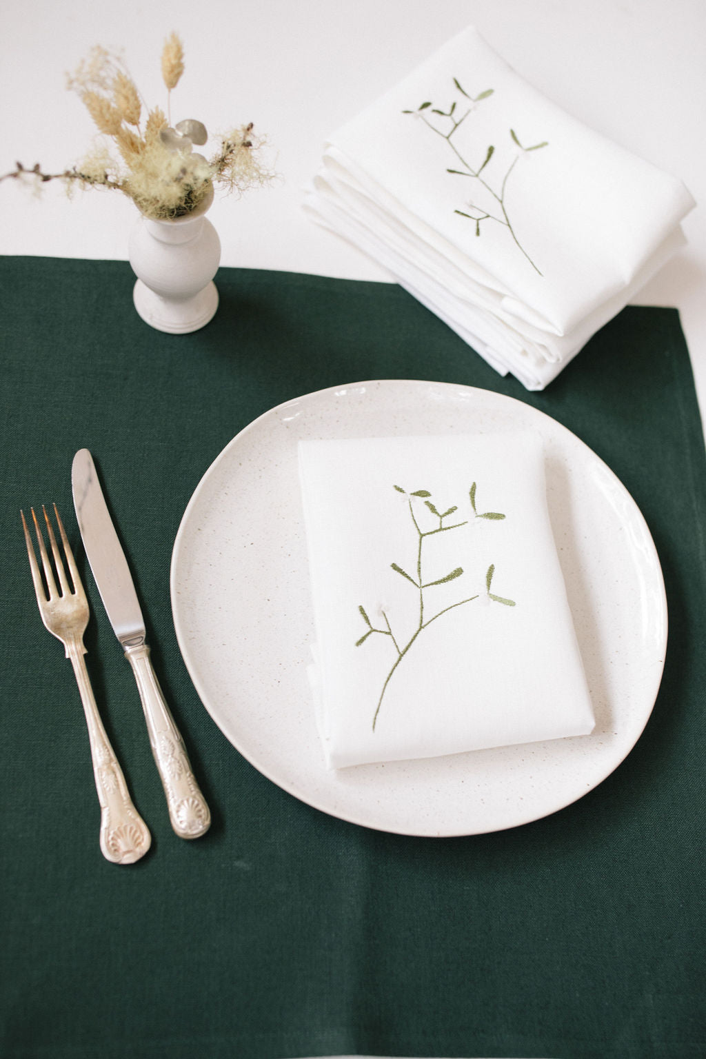 Ivory irish linen napkin with green mistletoe embroidery 