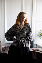 Irish linen wrap top with a dropped shoulder and voluminous sleeve. Ties around the waist with a bow at the front or back 