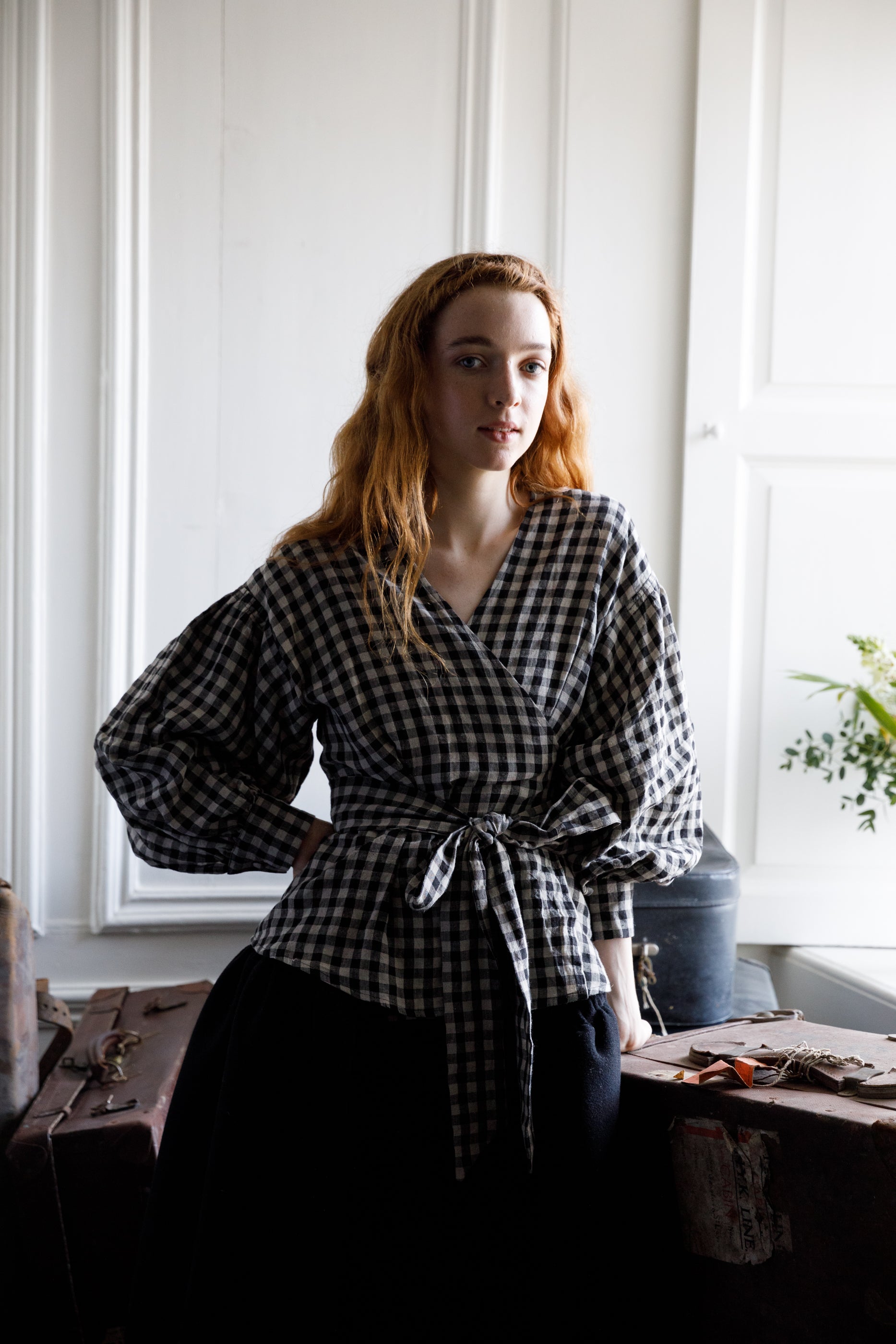 Irish linen wrap top with a dropped shoulder and voluminous sleeve. Ties around the waist with a bow at the front or back 